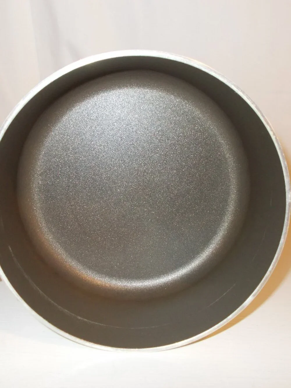 Mirro two liter saucepan and lid, almond and brown colors